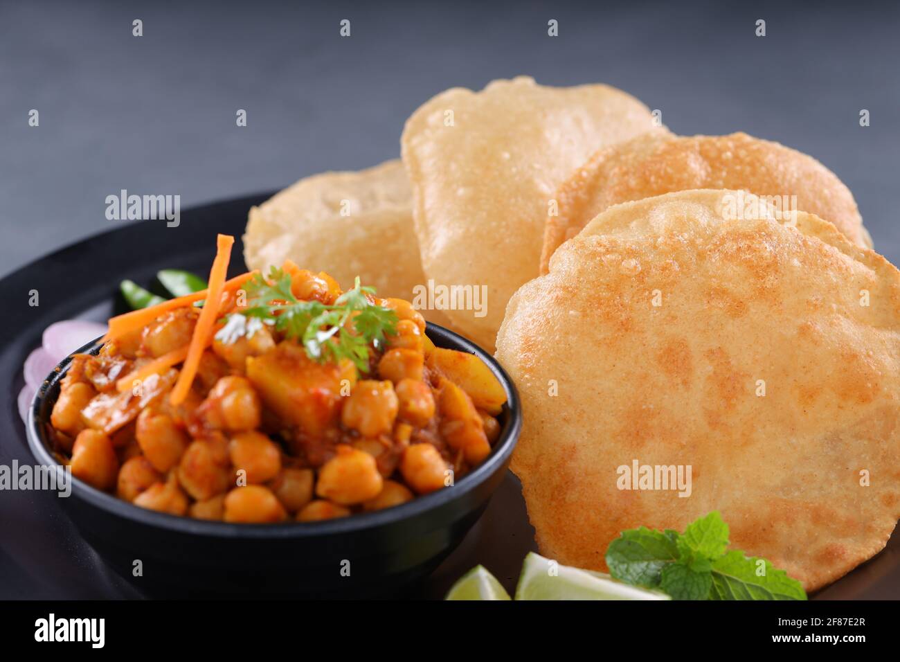 Indian breakfast Poori with chickpea chana masala curry,tasty indian