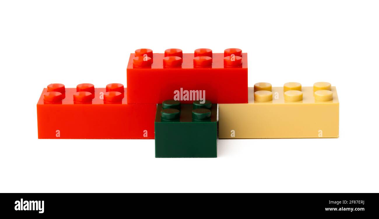 Colorful plastic toy building blocks isolated on white Stock Photo - Alamy