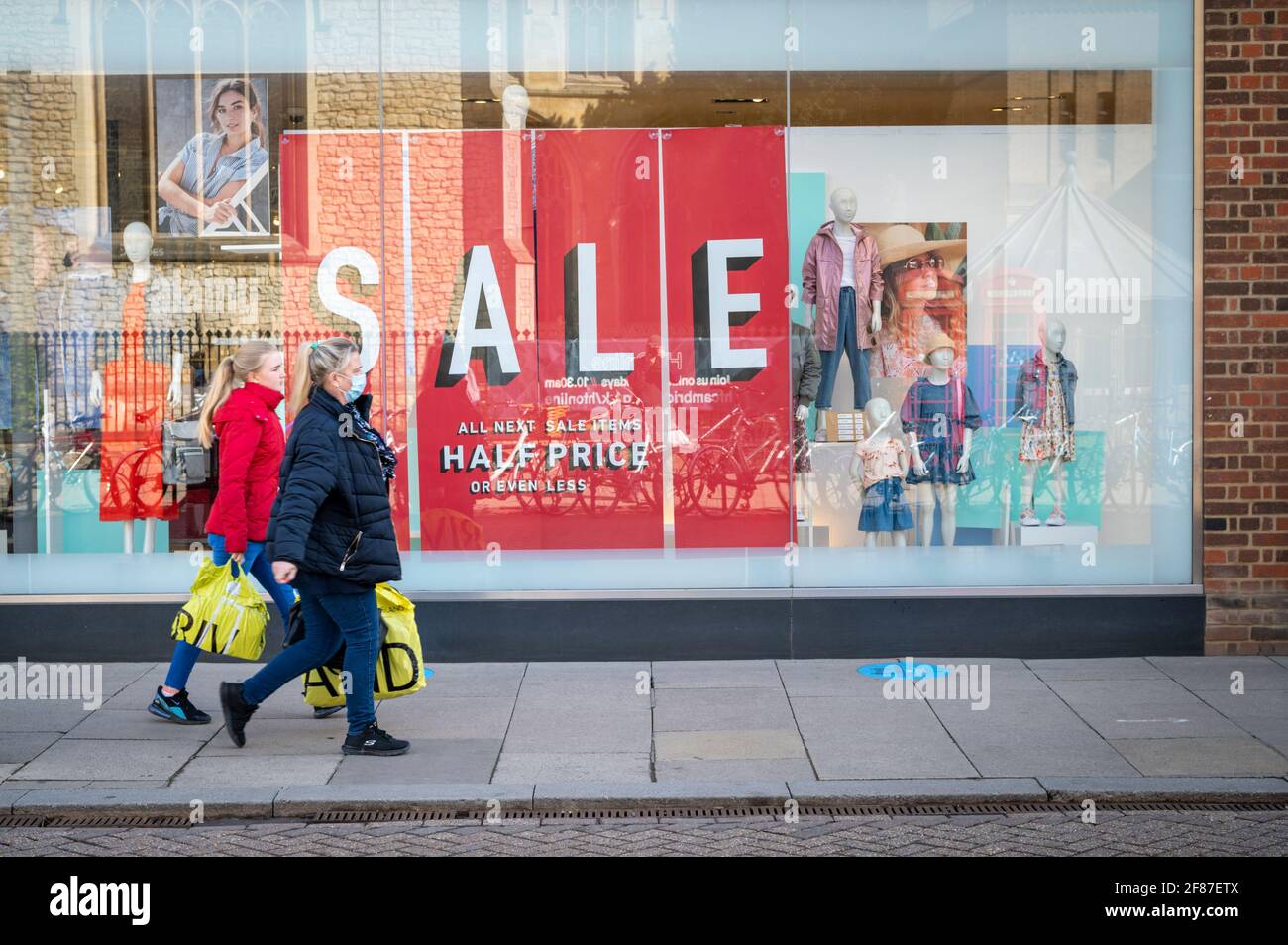 Cambridge, UK. 12th Apr, 2021. Shops reopen in Cambridge as part of the UK easing of Covid 19 lockdown restrictions. The roadmap allows opening of non essential shops across England today. It was a relatively quiet start to the morning as shoppers returned to high Street retail outlets. Credit: Julian Eales/Alamy Live News Stock Photo