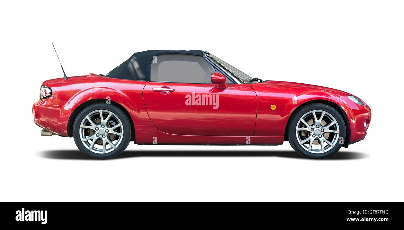 Red Mazda MX5 side view isolated on white background Stock Photo