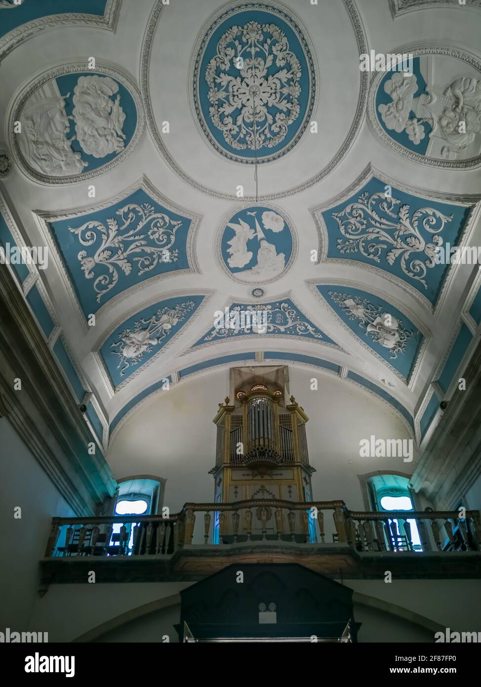 Lamego / Portugal - 07 25 2019 : View at the decorated Baroque style ceiling and pipe organ inside Lamego Cathedral, a baroque monument, architectural Stock Photo