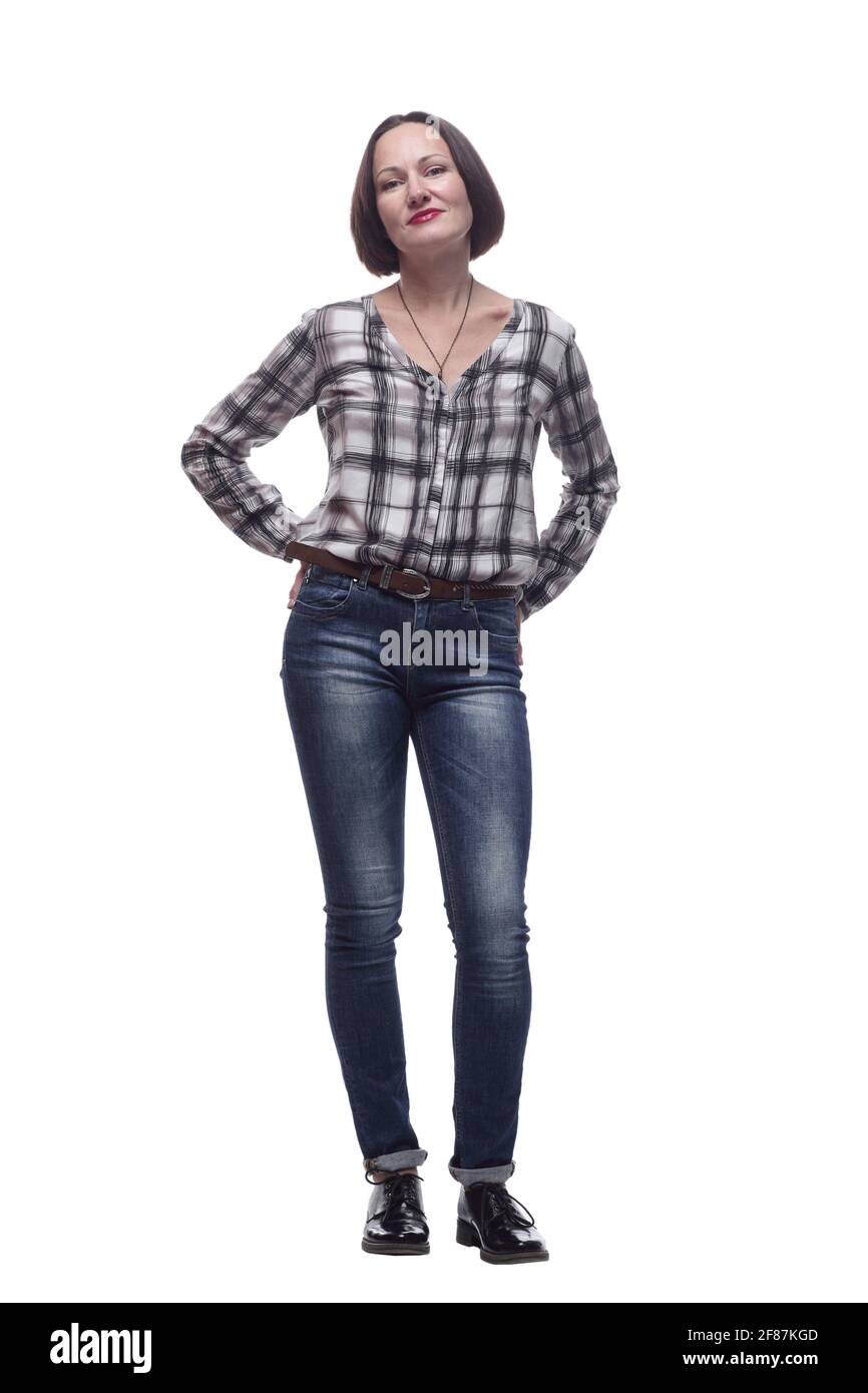 attractive mature woman in jeans looking at you Stock Photo - Alamy