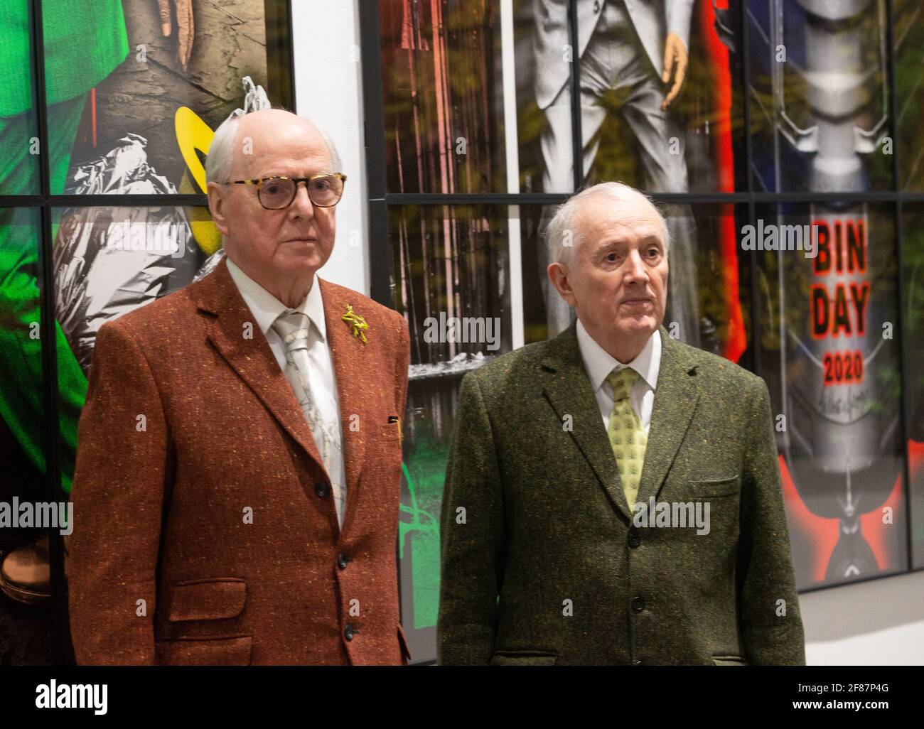London, UK. 12th Apr, 2021. ‘NEW NORMAL PICTURES', a solo exhibition by Gilbert & George bringing together 26 new pictures described by the artists as ‘celebratory, crazed and super-modern'. Continuing their ‘Pilgrim's Progress' through east London, the artists capture the mood of the moment and appear as zonked figures amongst disorientating cityscapes. Credit: Mark Thomas/Alamy Live News Stock Photo