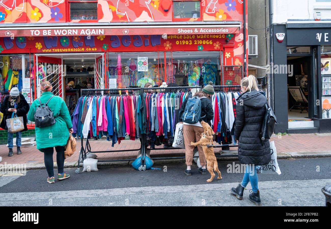 Brighton UK 12th April 2021 -  The North Laine area of Brighton is packed with shoppers as the next stage of lockdown easing begins in England with non essential shops being allowed to reopen : Credit Simon Dack / Alamy Live News Stock Photo