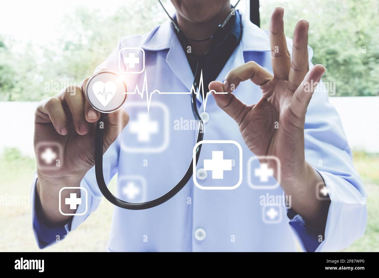 Doctor back using stethoscope hi-res stock photography and images - Alamy