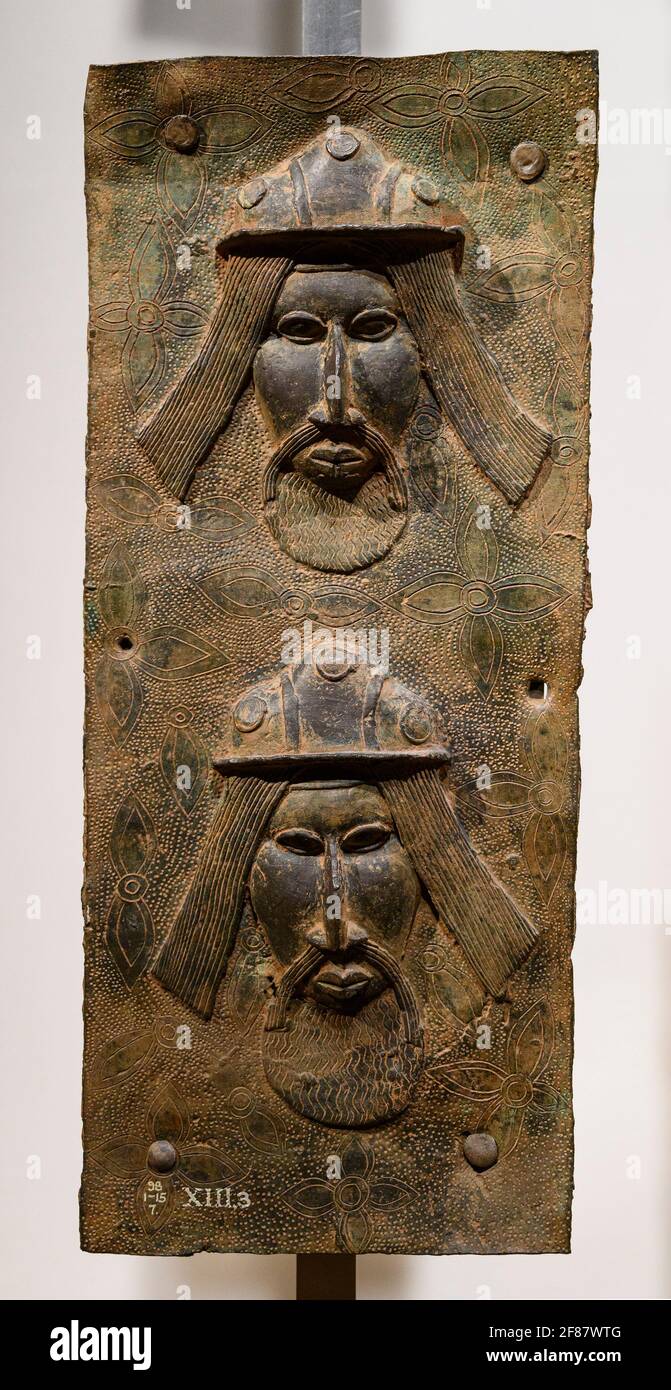 London. England. Benin Bronzes on display at the British Museum, brass plaques from the royal court palace of the Kingdom of Benin, 16-17th century. Stock Photo