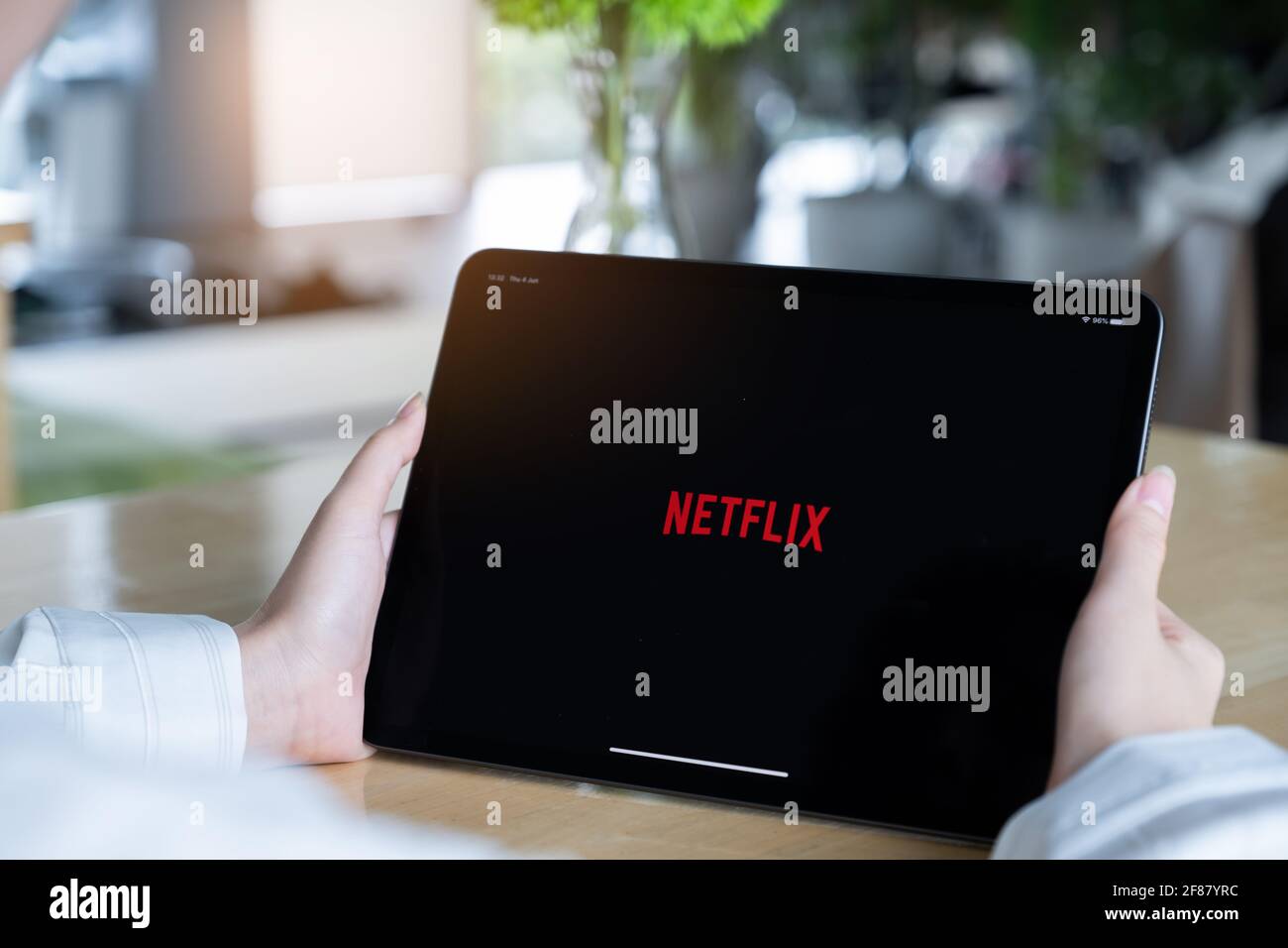 CHIANG MAI, THAILAND : JULY 26, 2020 : Netflix app on ipad screen. Netflix is an international leading subscription service for watching TV episodes Stock Photo