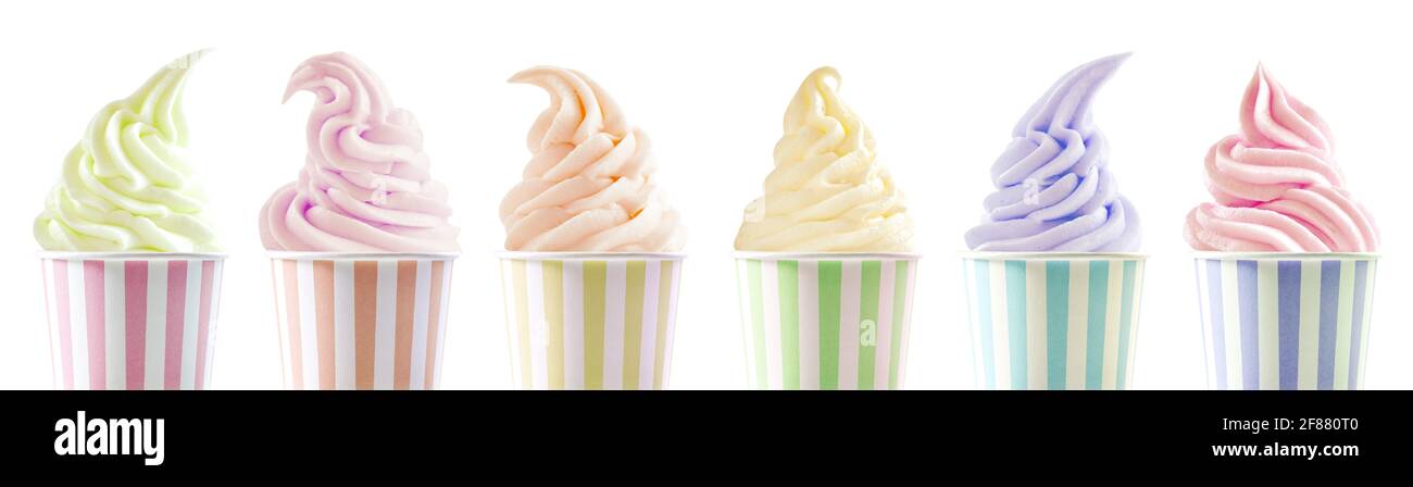 Row of six assorted ice cream flavours in differently styled twirls in colorful striped tubs isolated on white in a panorama banner or header for adve Stock Photo