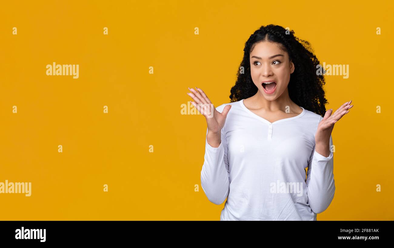 Amazed black woman afro hi-res stock photography and images - Alamy