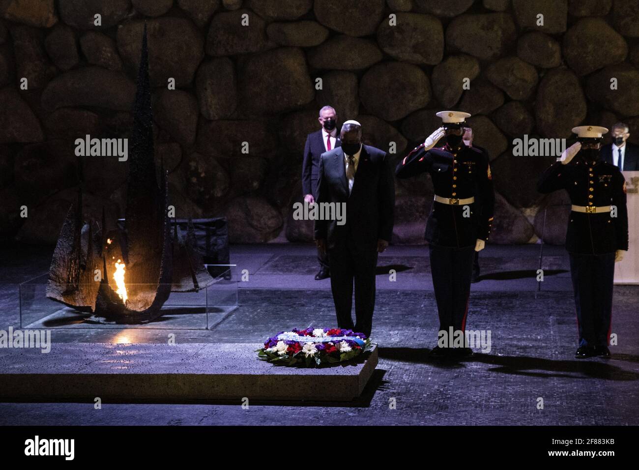 Jerusalem, Israel. 12th Apr, 2021. U.S. Secretary of Defense General Lloyd Austin with U.S. Marines during a memorial ceremony in the Hall of Remembrance during his visit to Yad Vashem on Monday, April 12, 2021. Pool Photo by Heidi Levine/UPI Credit: UPI/Alamy Live News Stock Photo