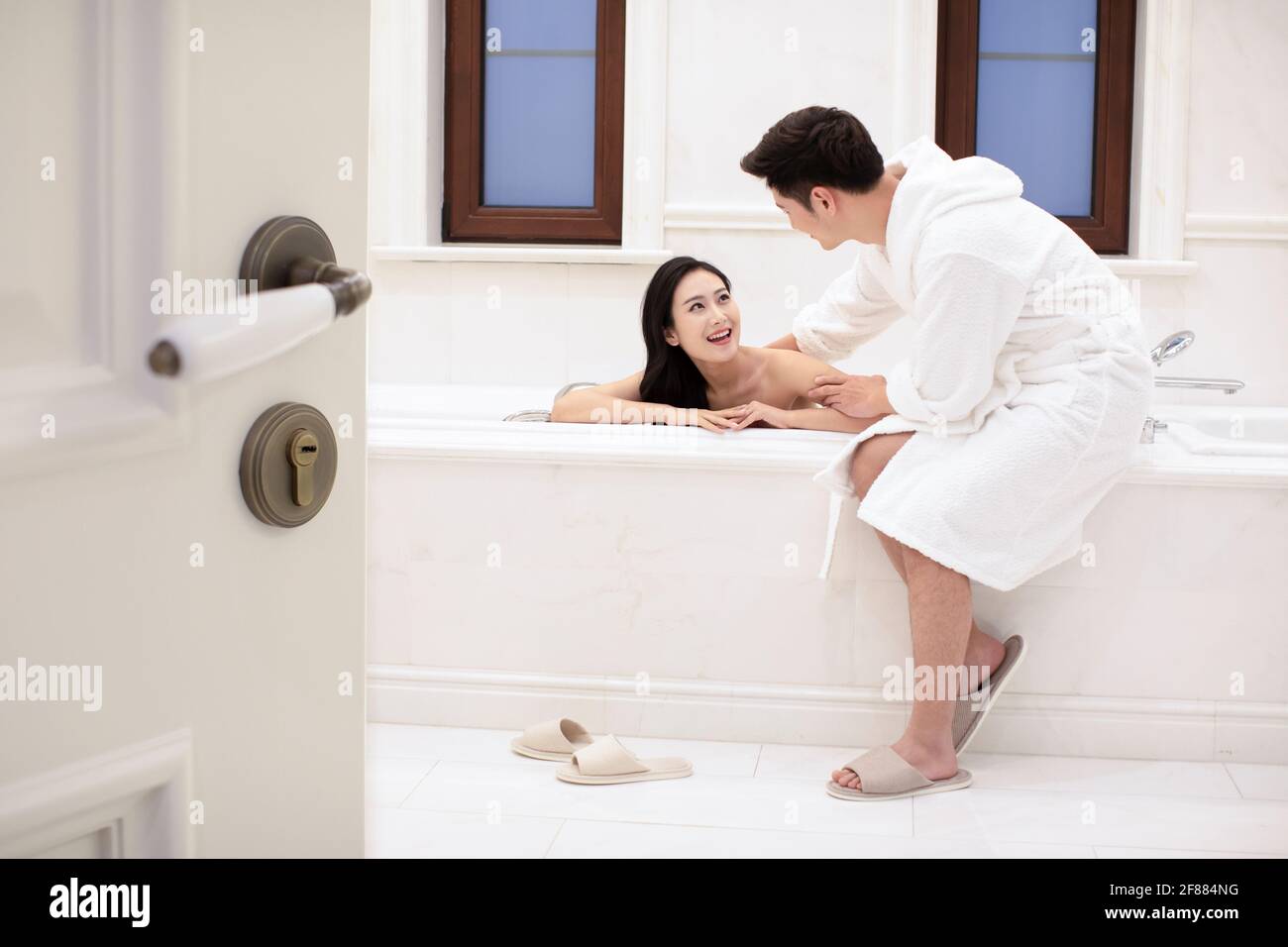 Loving young couple in bathroom Stock Photo Alamy