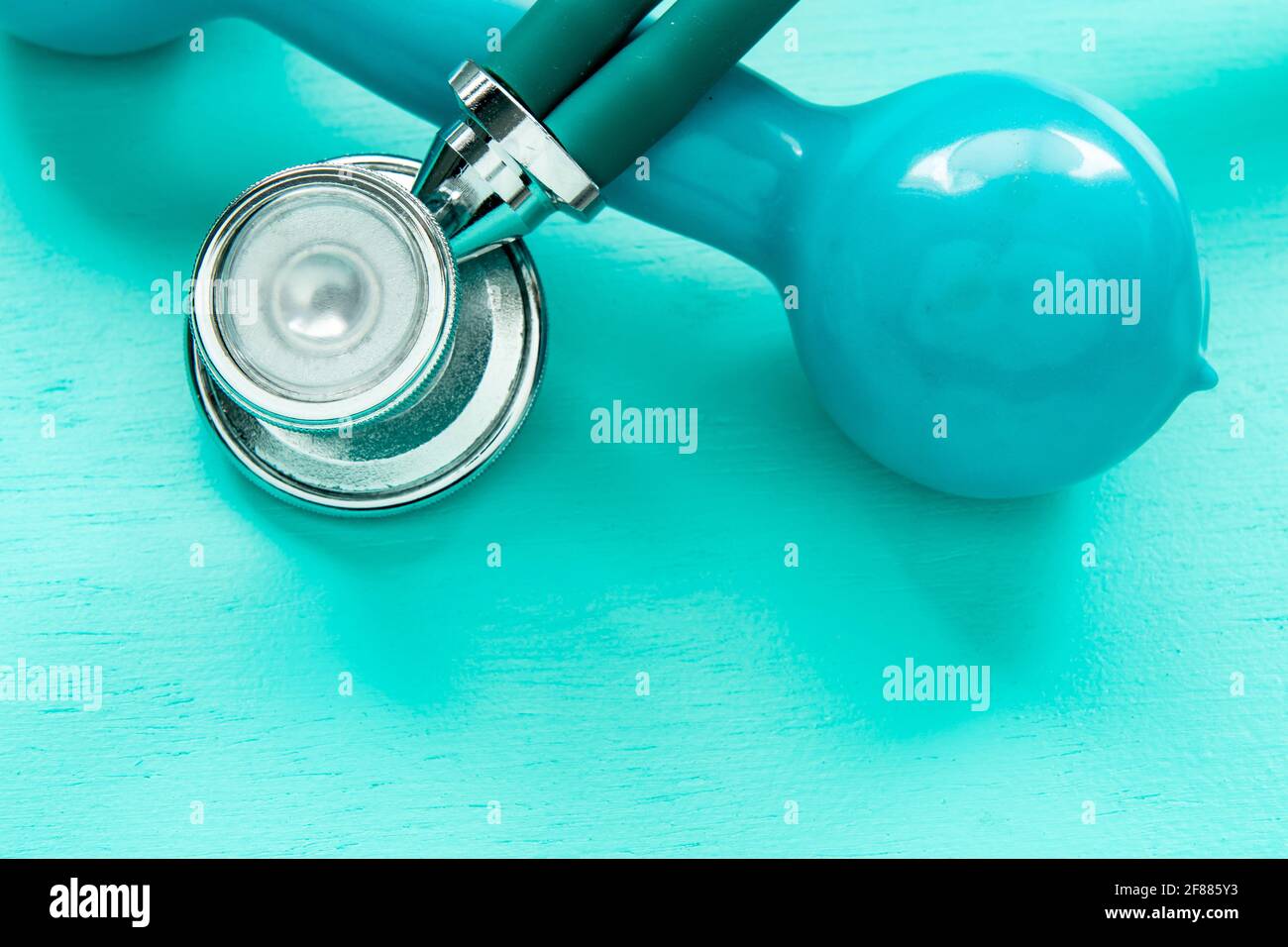 stethoscope and weight for physical exercise symbolizing mental balance Stock Photo