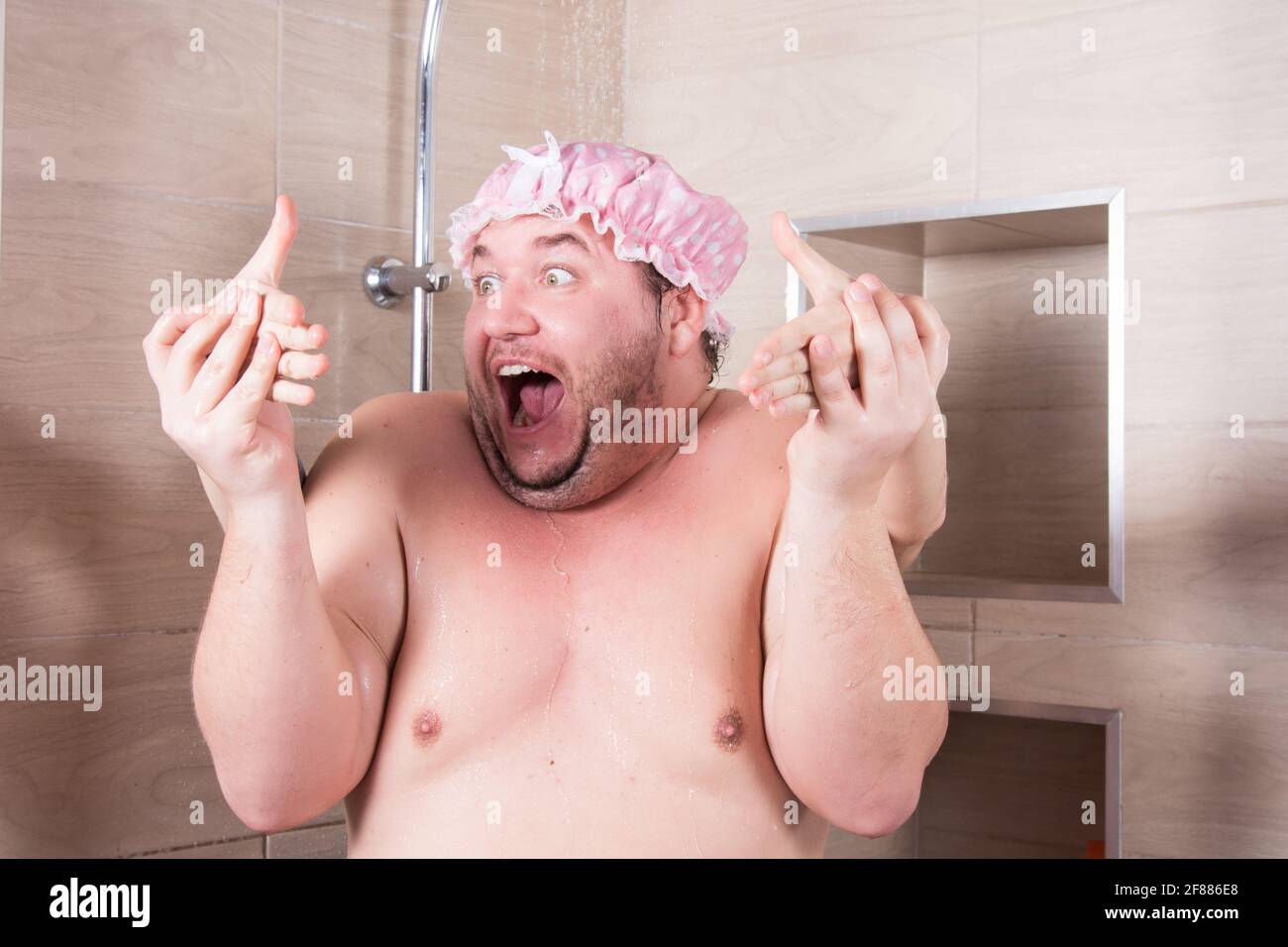 Funny fat man sings in the shower Stock Photo - Alamy