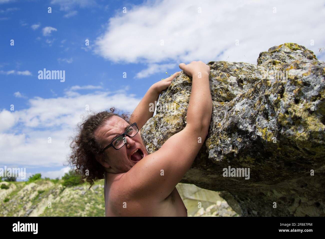 Risk of falling off cliff edge hi-res stock photography and images - Alamy