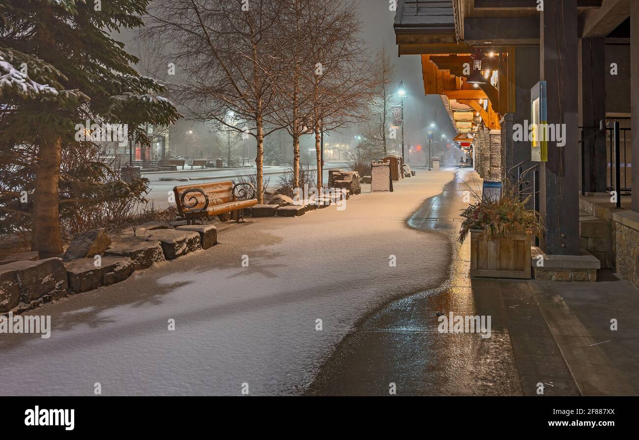 Early morning snowfall on Banff Avenue in Banff, Alberta, Canada Stock Photo