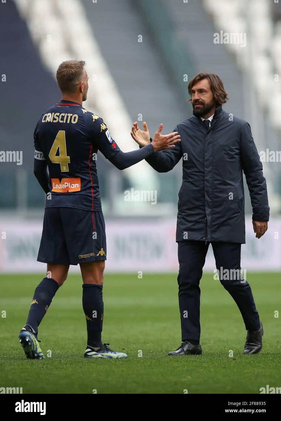 Turin, Italy, 11th April 2021. Andrea Pirlo Head coach of Juventus salutes  Domenico Criscito of Genoa CFC following the final whistle of the Serie A  match at Allianz Stadium, Turin. Picture credit, image size:928x1390