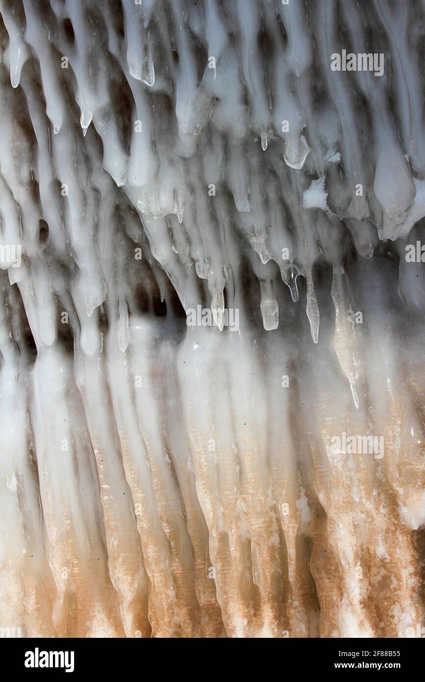 Close up of ice formations on red stone on Apostle Islands, Wisconsin Stock Photo