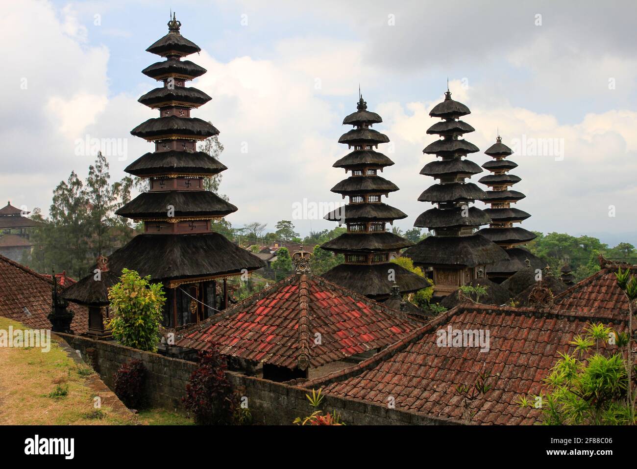 Temple spires of Pura Besakih with red roofs in Bali, Indonesia Stock Photo