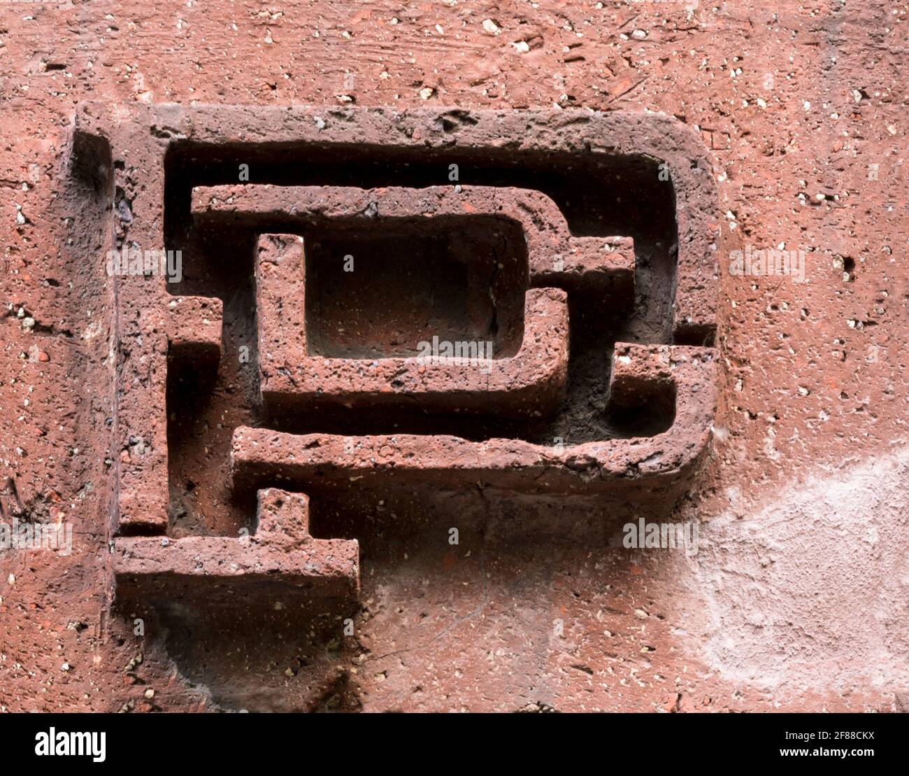 Letter P made from fired clay Stock Photo