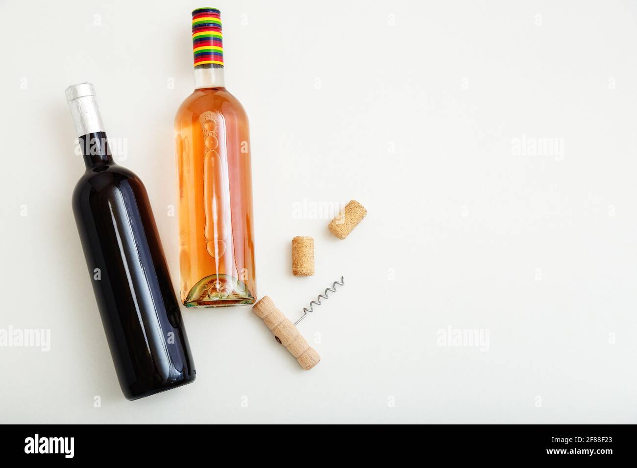 Download Rose Wine Bottle And Red Wine Bottle Corkscrew And Cork Minimalistic Wine Composition Top View On White Background Two Bottles Of Wine Brand Mockup Stock Photo Alamy