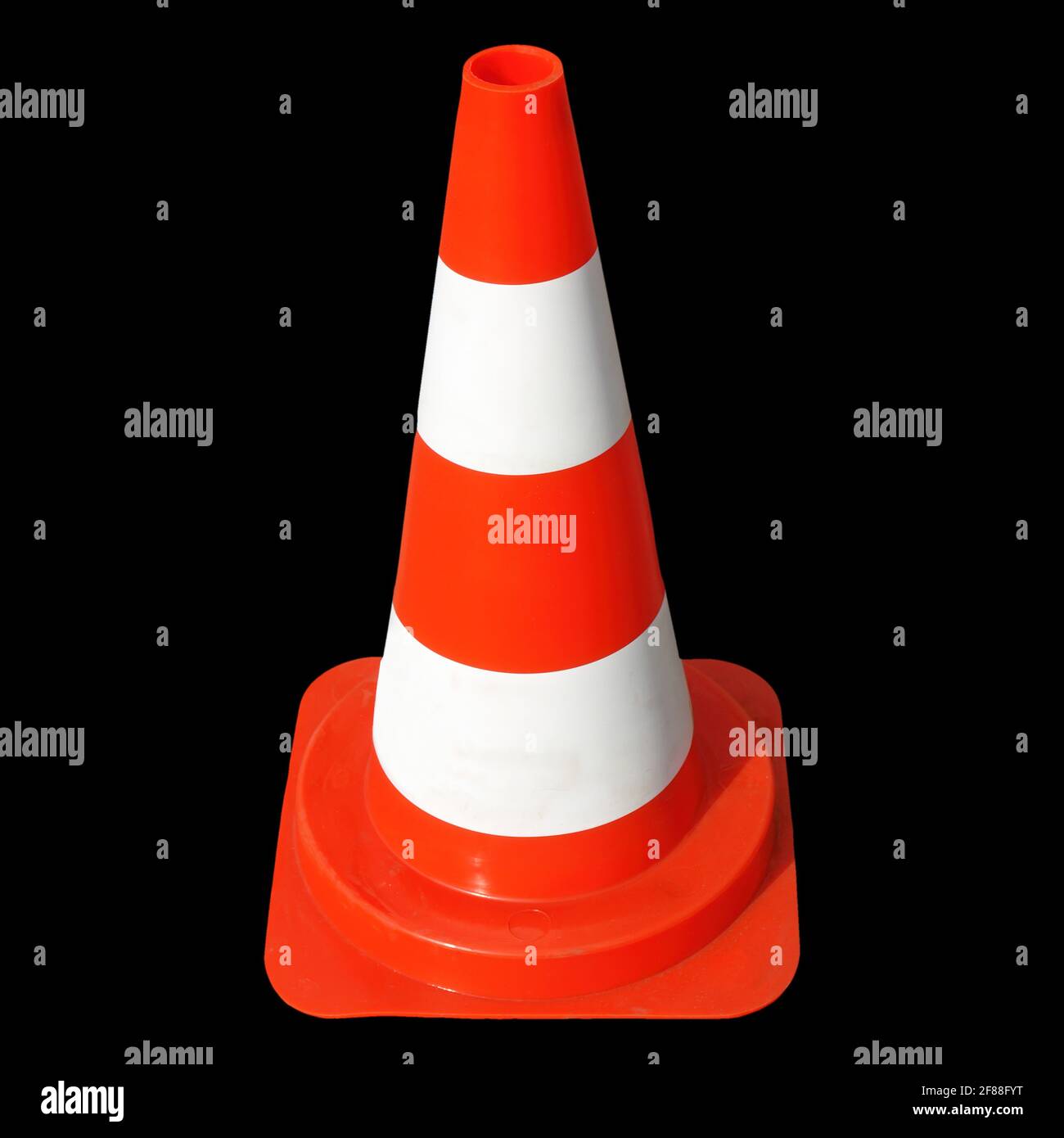 traffic cone sign over a black background Stock Photo - Alamy