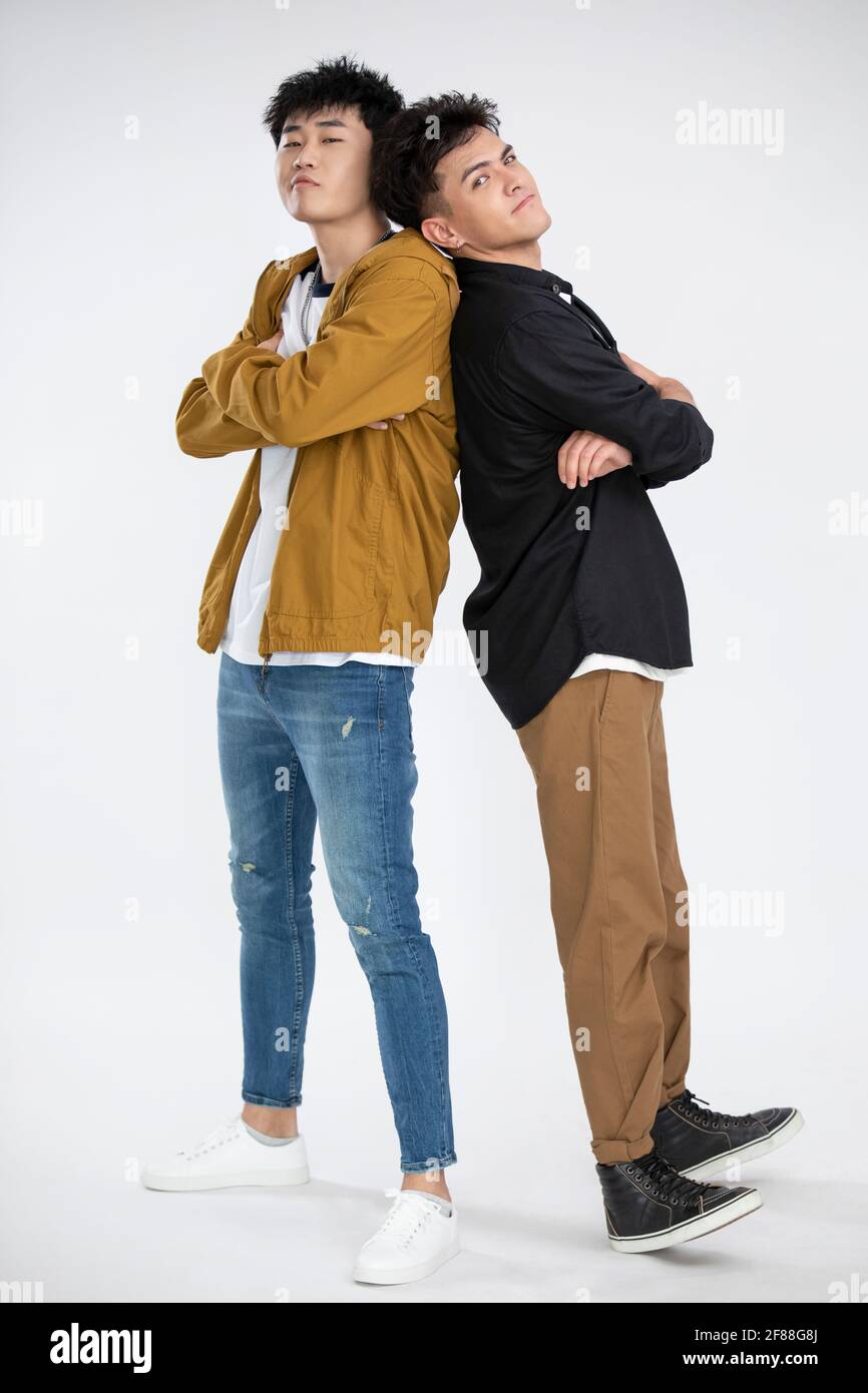 Back view of two men at east hi-res stock photography and images - Alamy
