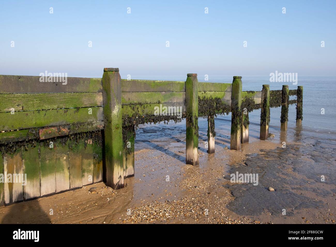 breache, broken sea defences Walton on the naze, tendring, Essex England Stock Photo