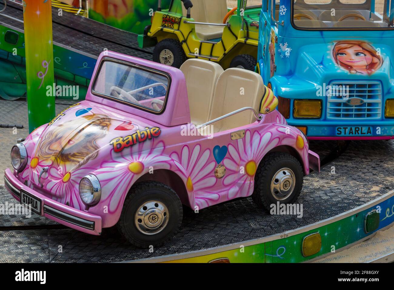 Barbie buggy car on fairground ride on Bournemouth beach as Covid-19  lockdown restrictions ease, Bournemouth, Dorset UK in April Stock Photo -  Alamy
