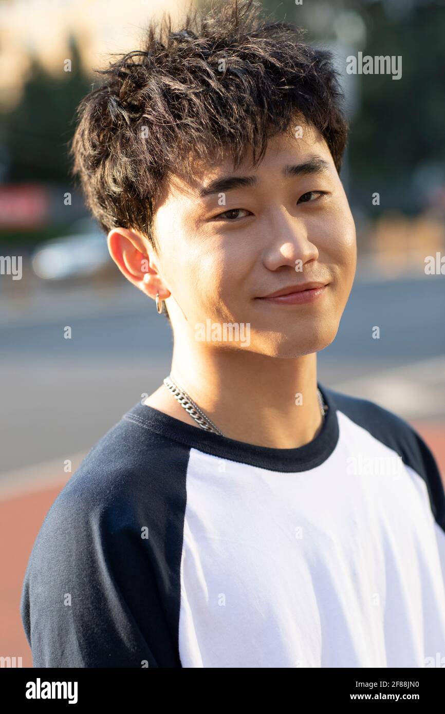 Fashionable young man on street Stock Photo