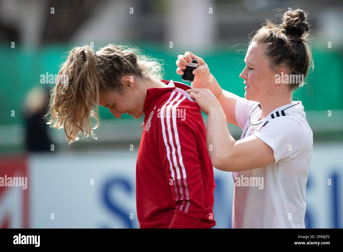 admiration Palace nose Offenbach Am Main, Germany. 12th Apr, 2021. Football: Women, national team, final training. Marina Hegering (r) helps Fabienne Dongus attach a GPS tracker. The women's national team will face Norway in an admiration Palace nose Offenbach Am Main, Germany. 12th Apr, 2021. Football: Women, national team, final training. Marina Hegering (r) helps Fabienne Dongus attach a GPS tracker. The women's national team will face Norway in an