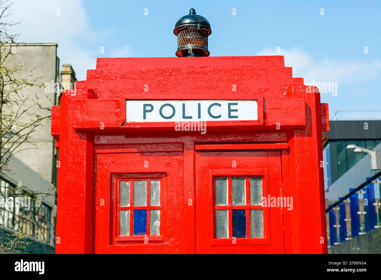 Police Phone Box painted red, Glasgow, Scotland, UK Stock Photo