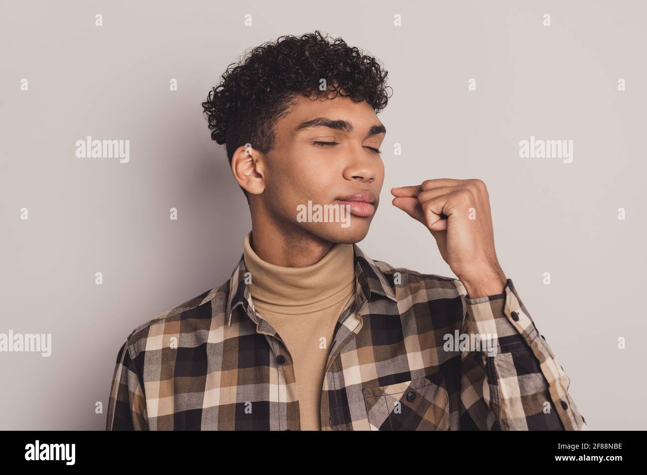 Photo of dark skin young calm handsome man give chef kiss enjoy food isolated on grey color background Stock Photo