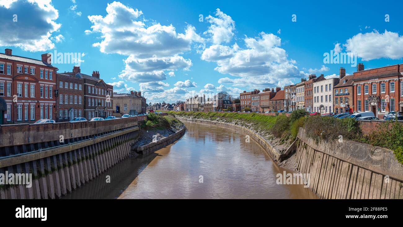 Panorama of the Georgian riverside terraces of the market town of Wisbech on the banks of the River Nene Stock Photo
