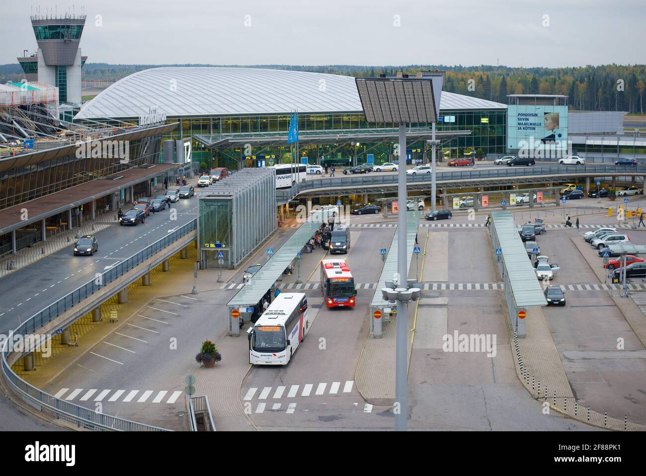 HELSINKI, FINLAND - SEPTEMBER 30, 2017: Terminal T2 of Vantaa International Airport on a cloudy October day Stock Photo