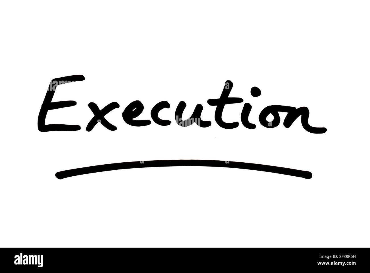 Execution, handwritten on a white background. Stock Photo