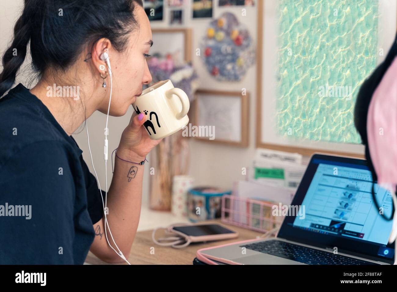 Young woman working on computer in her home office Stock Photo - Alamy
