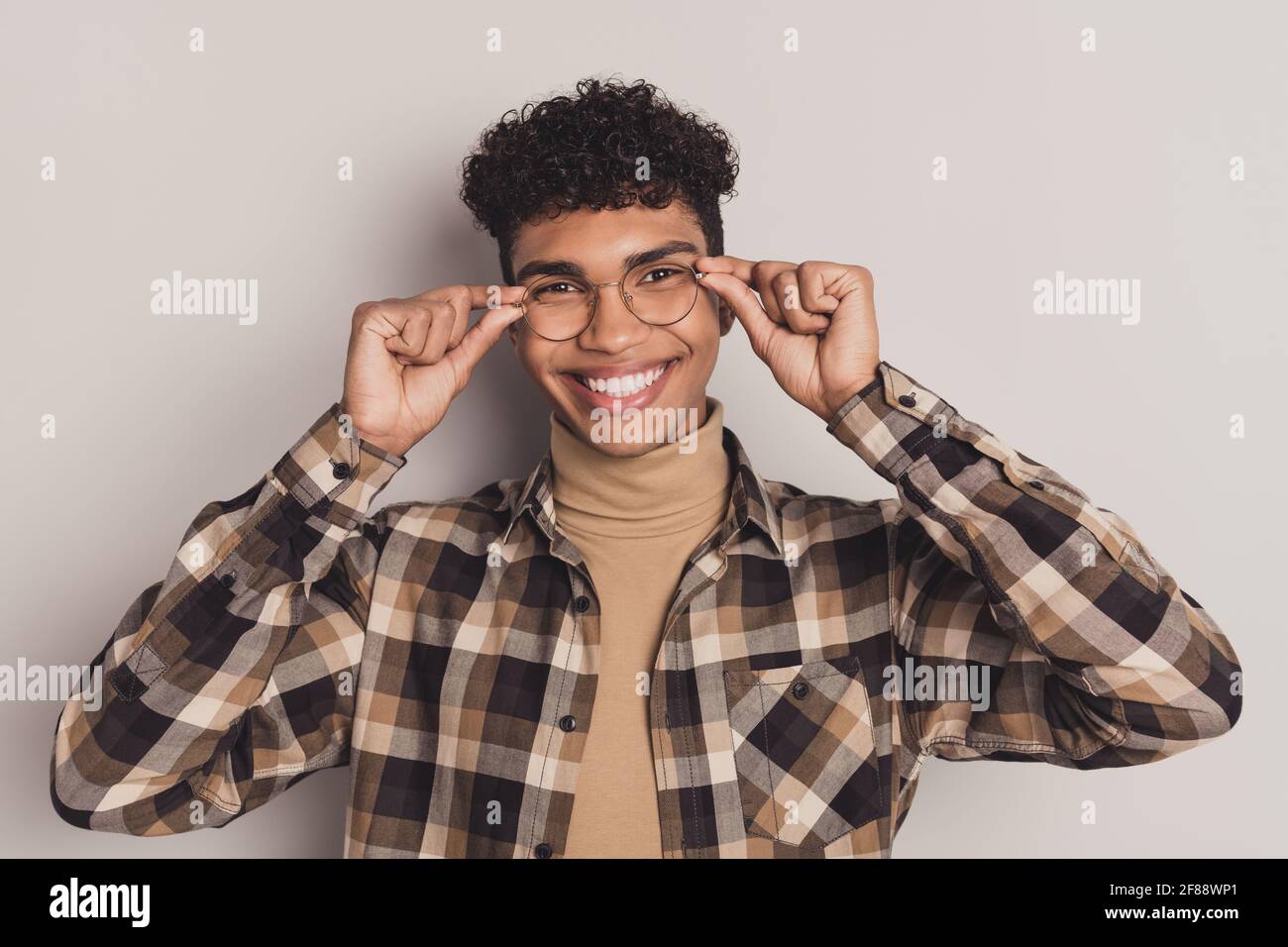 camera wear plaid shirt turtleneck 