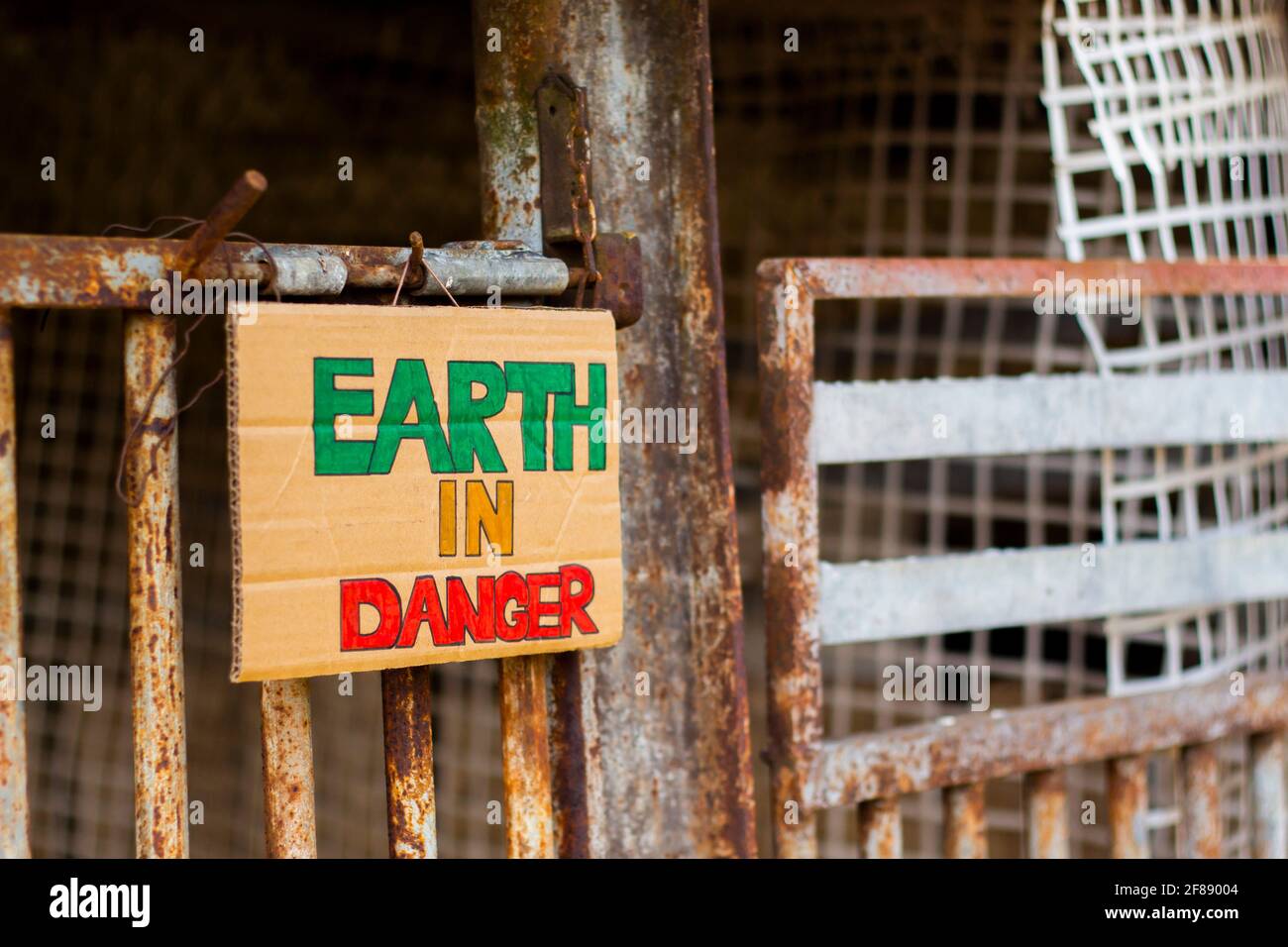 Earth In Danger title on cardboard. Stock Photo