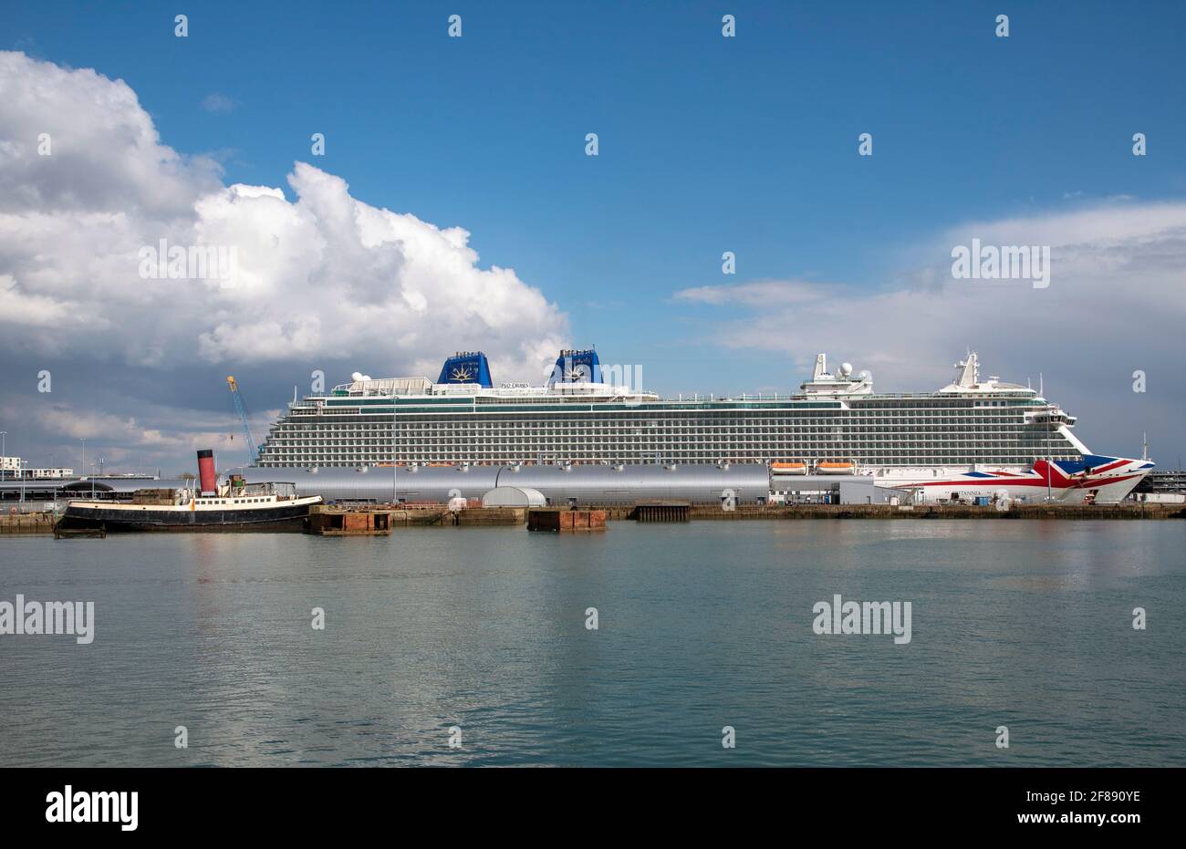 Southampton Hampshire England Uk 2021 Cruise Ship Britannia Looks Down On The Historic Ship Calshot Seen In Port Of Southampton During Covid Lo Stock Photo Alamy