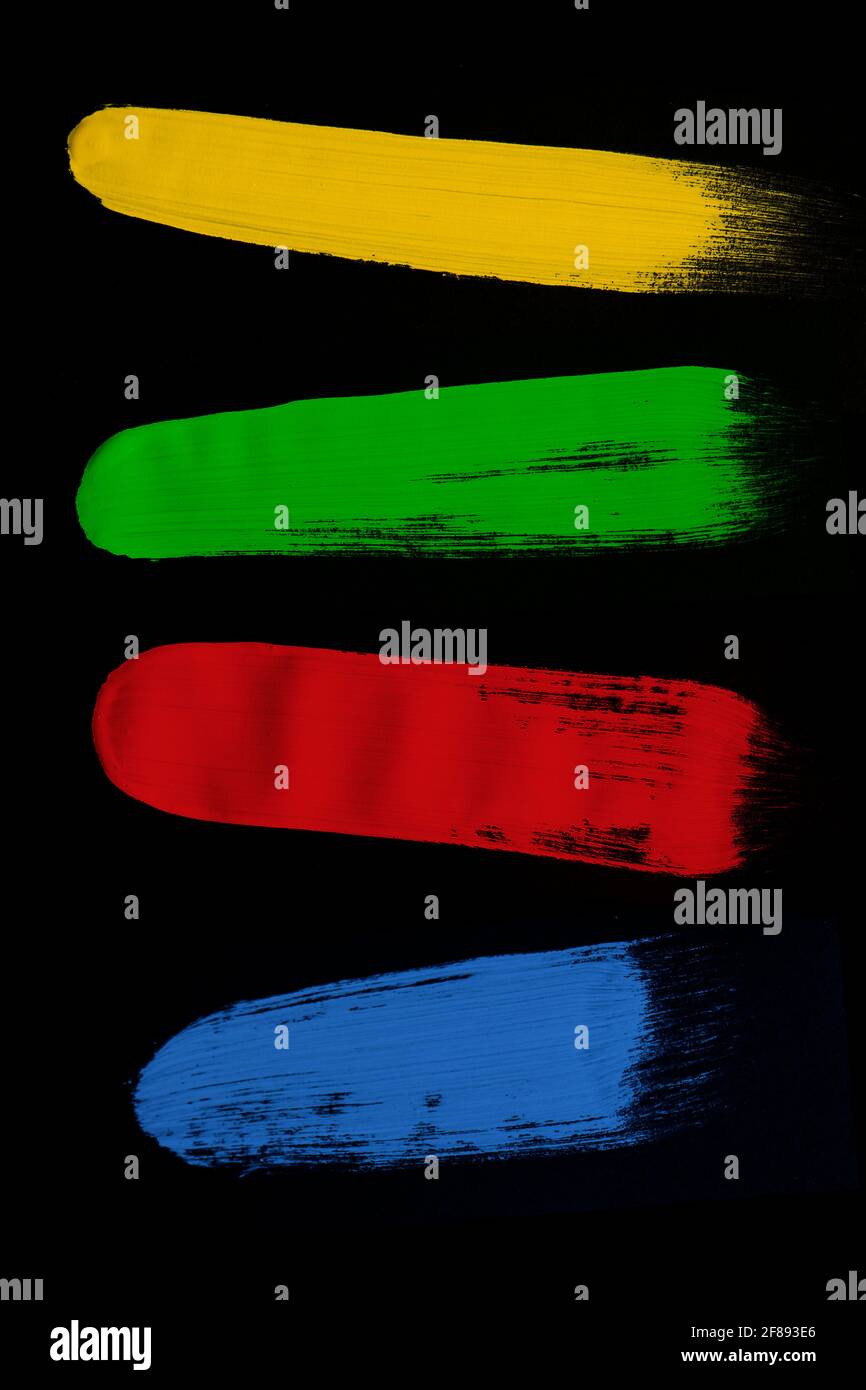 Colourful brush strokes on a black background Stock Photo