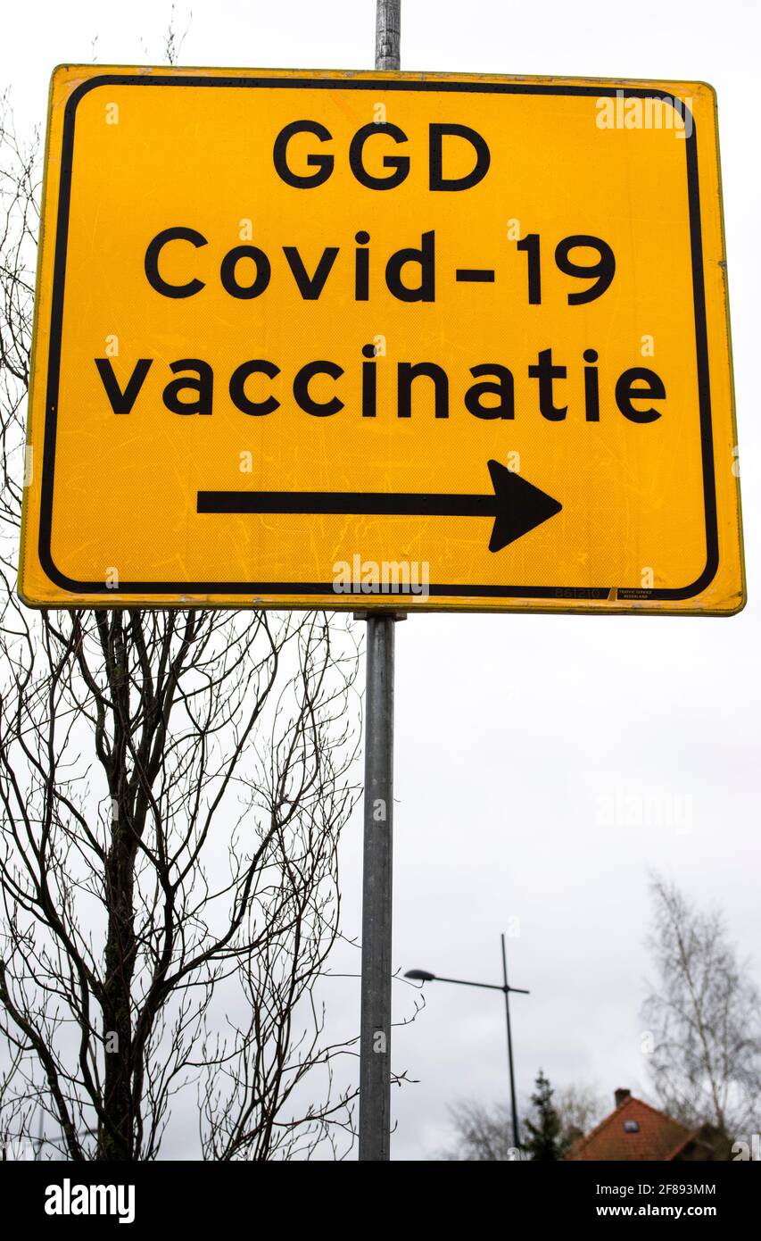 Signpost for a Covid-19 vaccination centre in the town of Veenendaal, the Netherlands Stock Photo