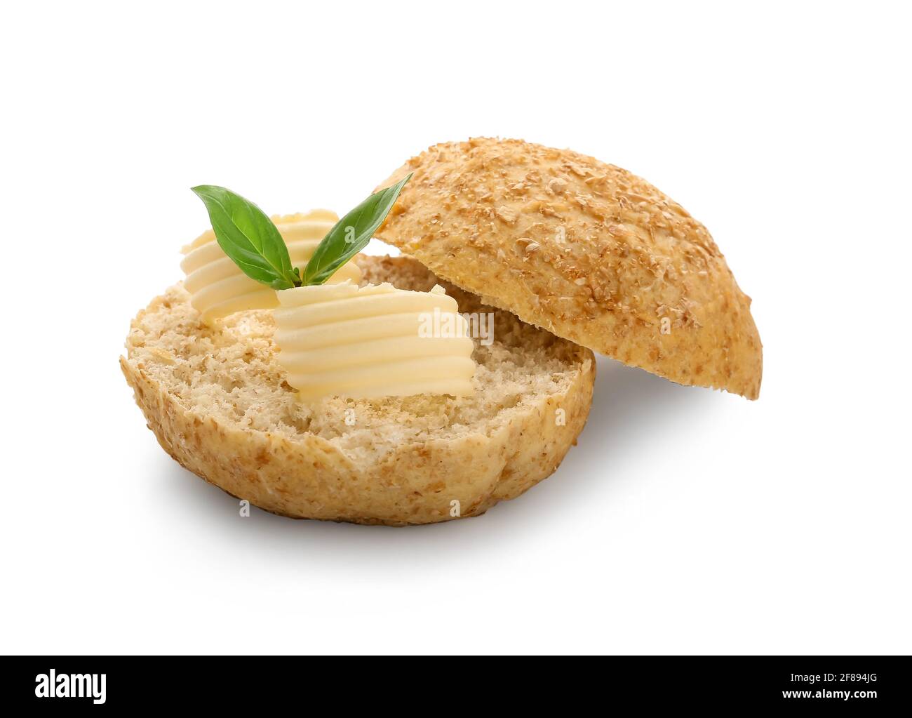 Fresh bread with butter and basil on white background Stock Photo - Alamy