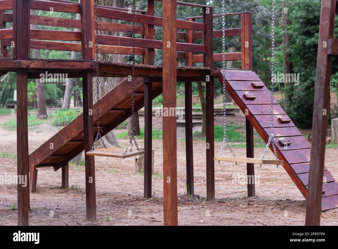 Wooden playground without kids during coronavirus. Stock Photo