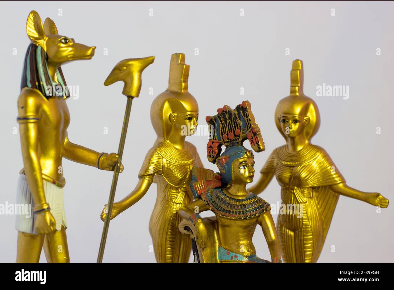 Still life with egyptian figures of anubis, pharaoh and the goddess nebtht and eset Stock Photo