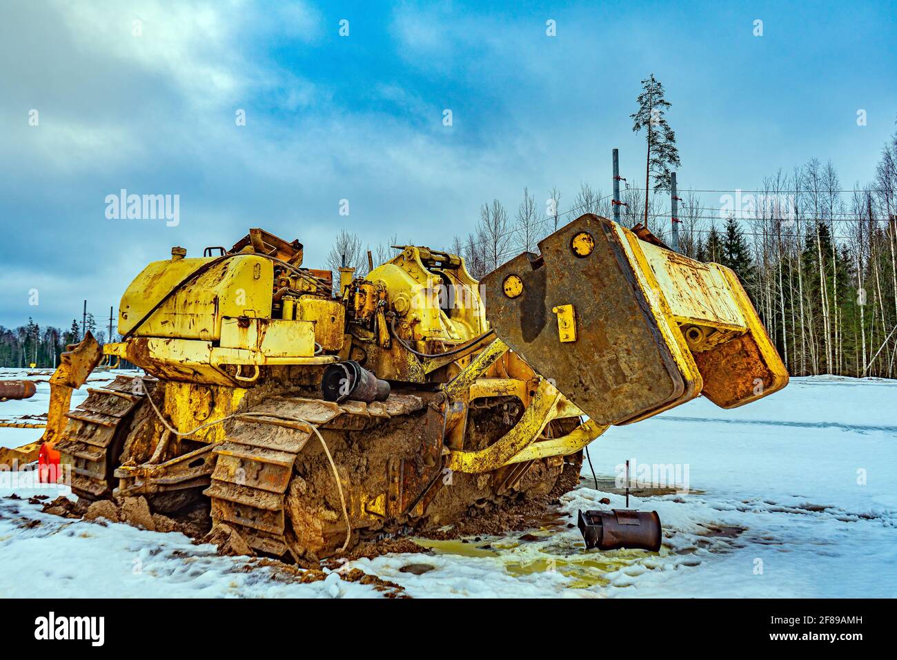 Large tractor for laying gas pipeline and oil pipeline pipes. Pipe-laying machine based on a crawler bulldozer. Construction site of the main gas Stock Photo