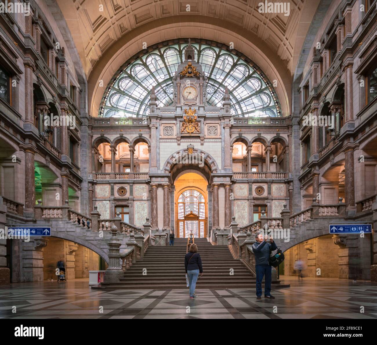 Antwerp, Belgium - 04.29.2018: Inside the old part of Antwerpen-Centraal train station. Old urban industrialarchitecture with lot of symmetries. Stock Photo