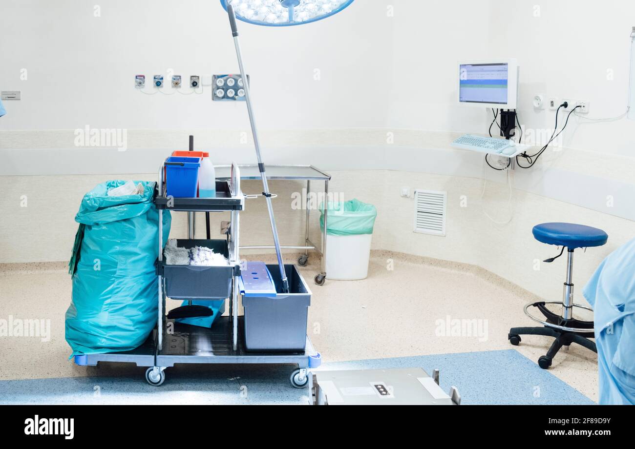 Cart with cleaning supplies in a hospital room Stock Photo Alamy