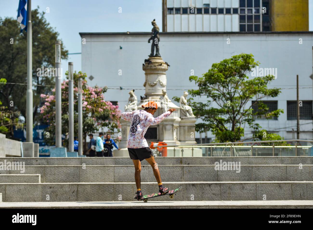 A man skates in front of the Francisco Morazan Plaza.El Salvador reports more than 66 thousand confirmed COVID-19 cases as well as 2,054 deaths. Stock Photo