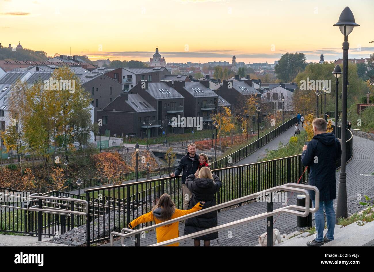 Vilnius, Lithuania - October 24, 2020: The leisure time of the city residents and guests at sunset in the renovated old part of Vilnius - Paupys Stock Photo