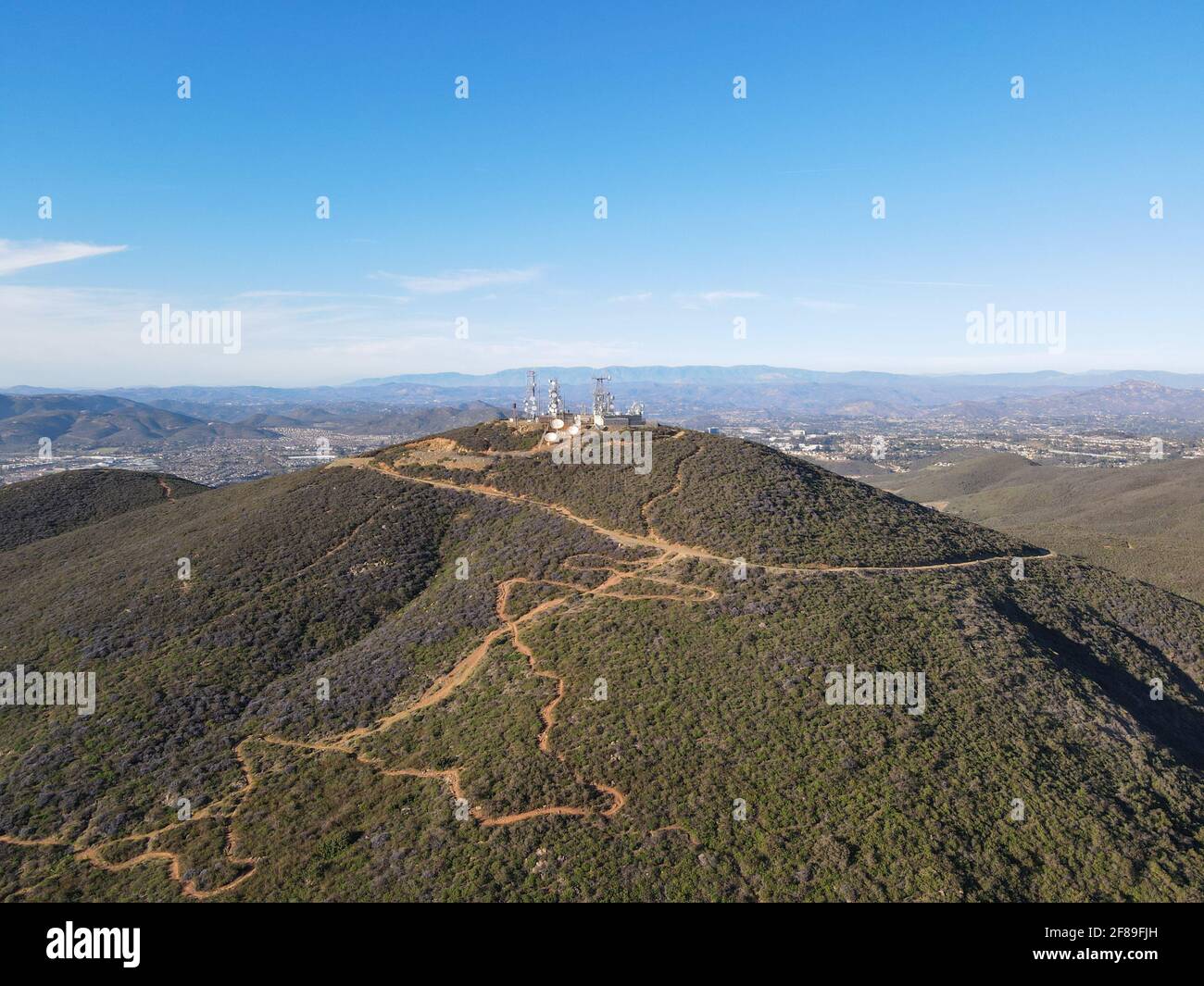 Telecommunication antennas on the top of a mountain. Television, radio ...